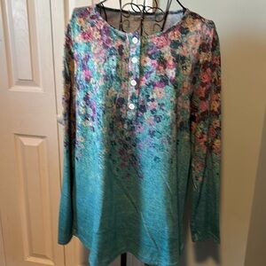 Beautiful multicolored floral long sleeve shirt.
